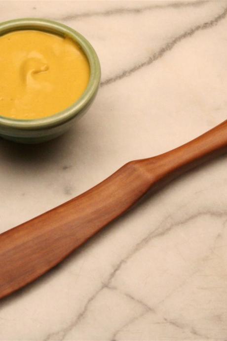 Wooden utensil spreader knife carved from salvaged Apple wood