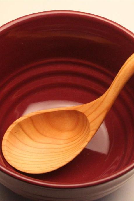 Treenware wooden spoon carved from salvaged Plum wood