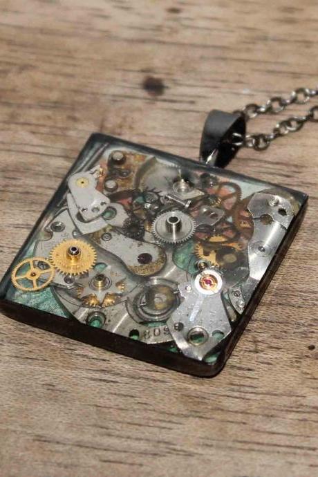 Pretty steampunk square pendant from vintage watch parts