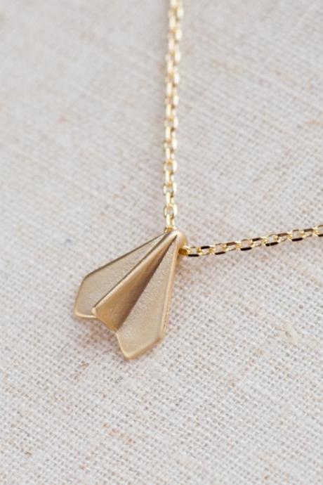 paper airplane necklace in gold
