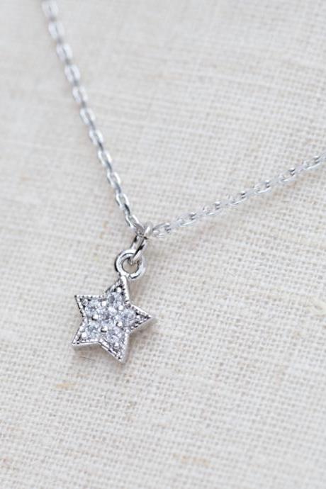 Tiny rhinestone star necklace in silver