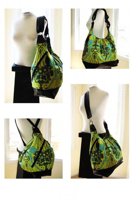 Extra large convertible backpack purse in bouquet green turquoise fabric with leather straps and base