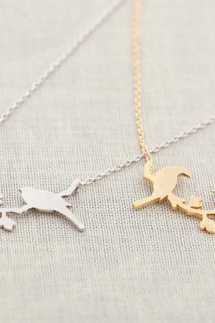 bird on a branch necklace in gold