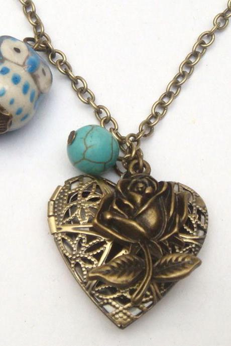 Antiqued Brass Flower Turquoise Porcelain Owl Locket Necklace