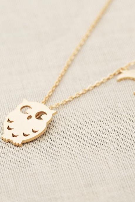 Owl and crescent necklace in gold